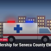 Illustration of a white ambulance with red and blue lights on a city street, with headline: New Leadership for Seneca County EMS